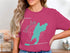 Pink t-shirt with Snow Lake Washington map and compass graphic.