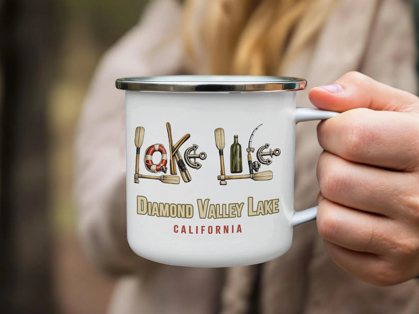 Enamel mug with lake-themed icons spelling "Lake" and "Diamond Valley Lake California".