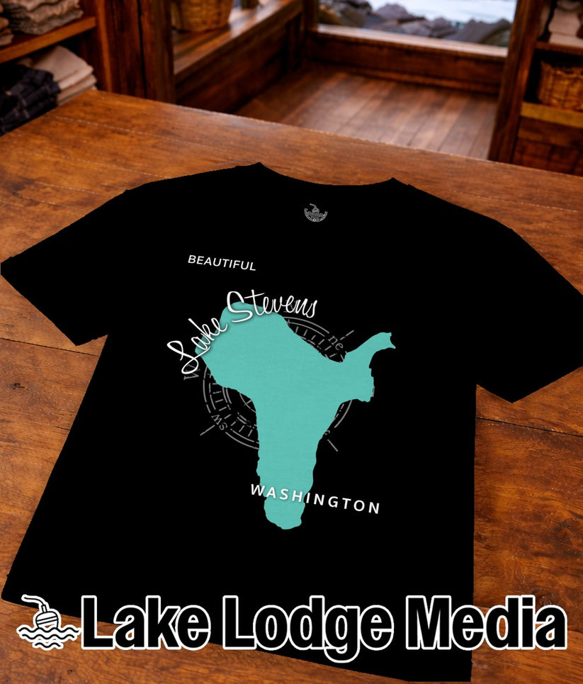 Black t-shirt with turquoise outline of Lake Stevens, WA and compass rose.