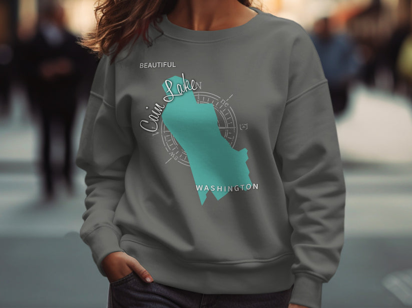 Crewneck sweatshirt with a teal map outline of Coupeville, Washington.
