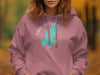 Pink hoodie with turquoise Lake Placid map graphic and compass rose.
