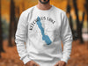 White sweatshirt with Keechelus Lake, Washington map outline and compass graphic.