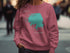 Rose pink sweatshirt with "Beautiful Lake Hefner Oklahoma" map graphic.