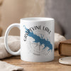 White mug with blue map of Grapevine Lake, Texas, and compass rose graphic.