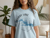 Light blue t-shirt with DeGray Lake Arkansas compass graphic and trees.