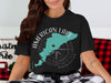 Black t-shirt with American Lake Washington map and compass graphic.