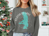 Gray sweatshirt with Flathead Lake Montana map and compass graphic.