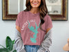 Mauve t-shirt with turquoise lake map and compass graphic, text reads Moss Lake North Carolina.