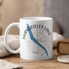 White mug with "Skaneateles Lake" text and blue lake outline over compass.