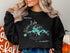 Black sweatshirt with compass rose and map of Weiss Lake, Alabama.