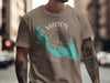 Taupe t-shirt with turquoise Lake Marion map and compass graphic.