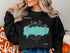 Black sweatshirt with a compass design and "Grand Lake St. Marys Ohio" text.
