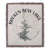 Woven blanket with "Broken Bow Lake Oklahoma" text and compass design.
