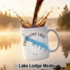 White mug with "Grapevine Lake Texas" map design, coffee pouring.