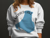 White sweatshirt with Emerald Lake Canada map and compass design.