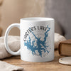 White mug with Carters Lake map and Georgia text, steaming.