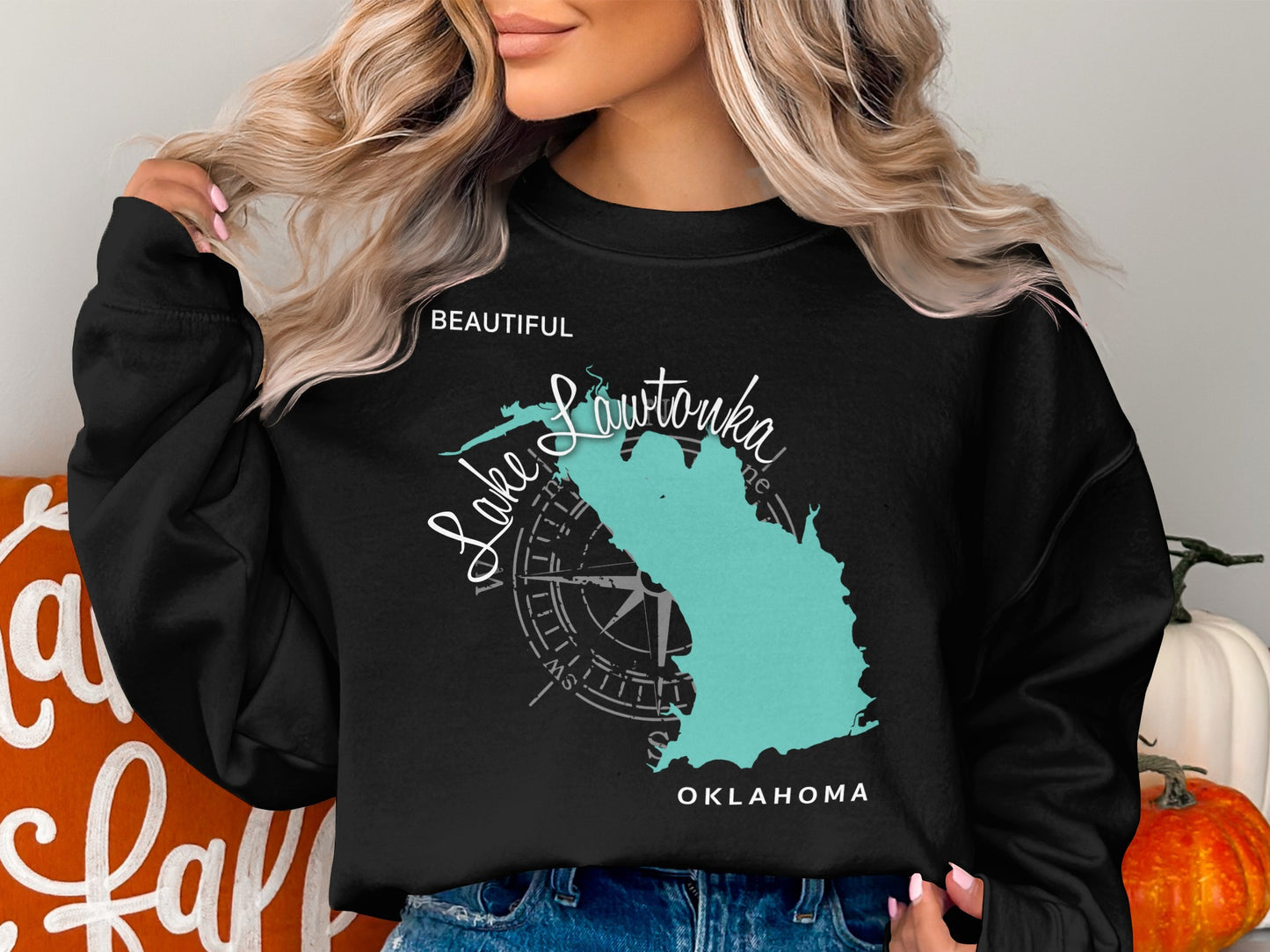 Black sweatshirt with a teal map outline of Lake Lawtonka, Oklahoma.