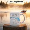 Pactola Lake South Dakota mug with compass and map on a wooden post.