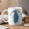 White mug with Lake Derwentwater map and compass design, "ENGLAND" text.