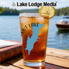 Glass of iced tea with a lemon slice, displaying a map of "OUT LAKE".