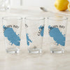 Three clear glasses with blue Georgian Bay map and text.