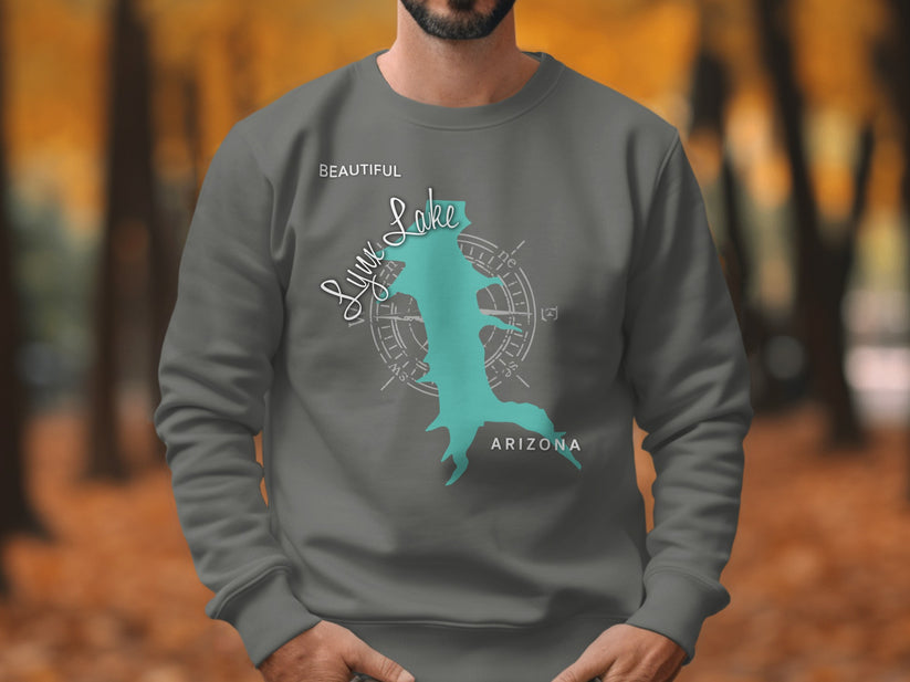 Grey sweatshirt with turquoise Lynx Lake, Arizona map graphic and compass rose.