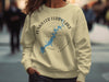 Light yellow crewneck sweatshirt with Tenkiller Ferry Lake map and compass graphic.