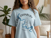 Light blue t-shirt with "Lake Granbury Texas" and a compass graphic.
