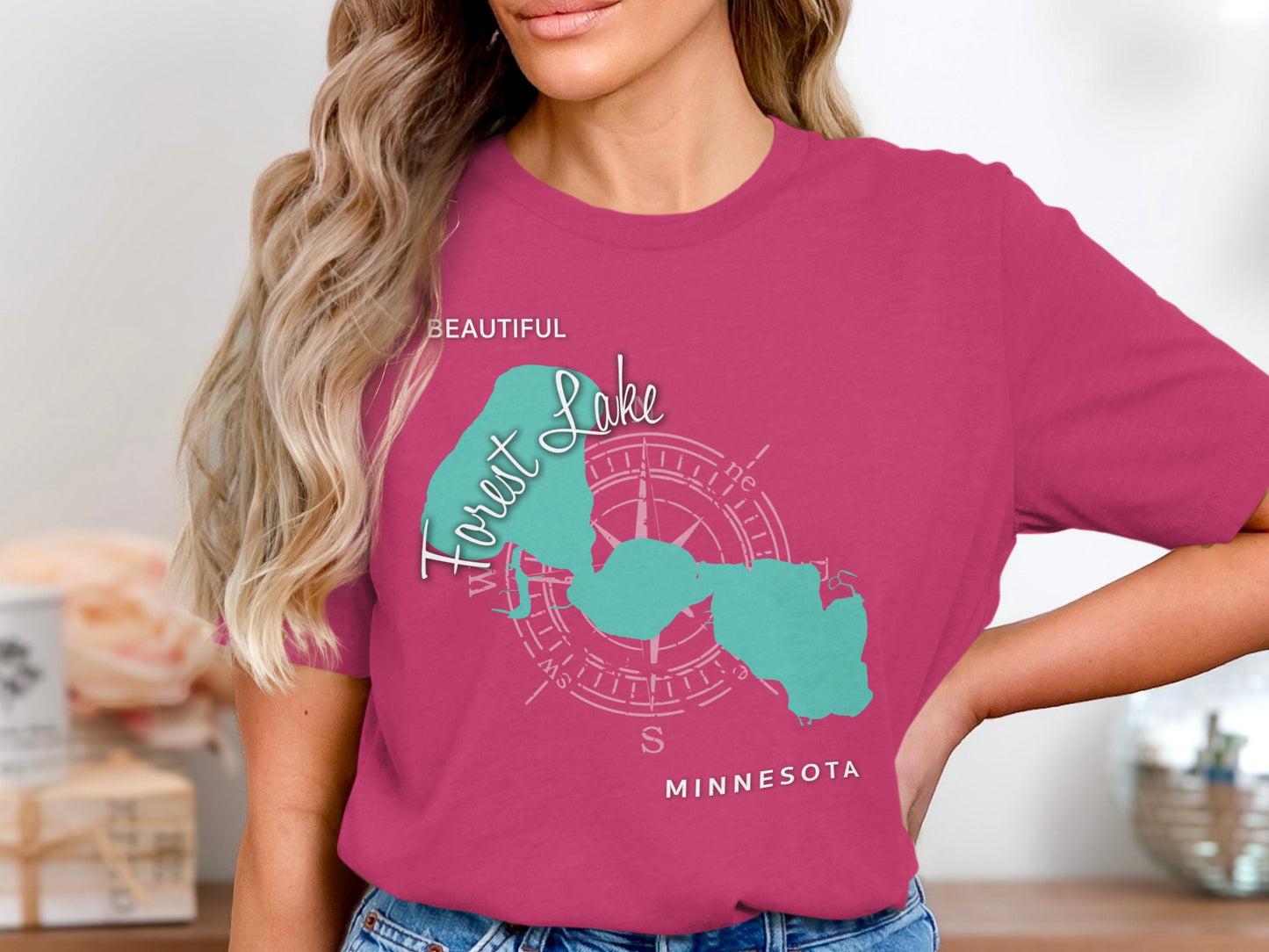 Turquoise map of Forest Lake, Minnesota on a magenta t-shirt.