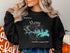 Black sweatshirt with Lake Murray, South Carolina map and compass rose design.