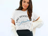White t-shirt featuring a compass graphic with "Lake Hickory North Carolina" text.