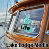 Turquoise lake outline sticker on boat window reads "Tohopekaliga Life".