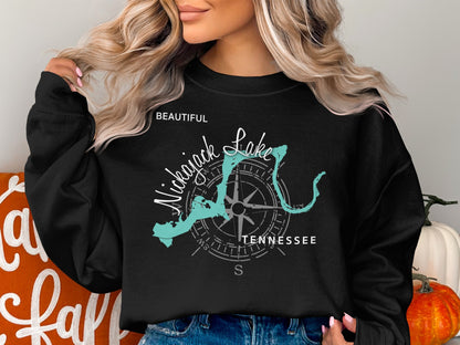 Black sweatshirt with "Beautiful Nickajack Lake Tennessee" and compass graphic.