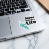 Sticker with turquoise lake outline and text "New Melones Life" on laptop.