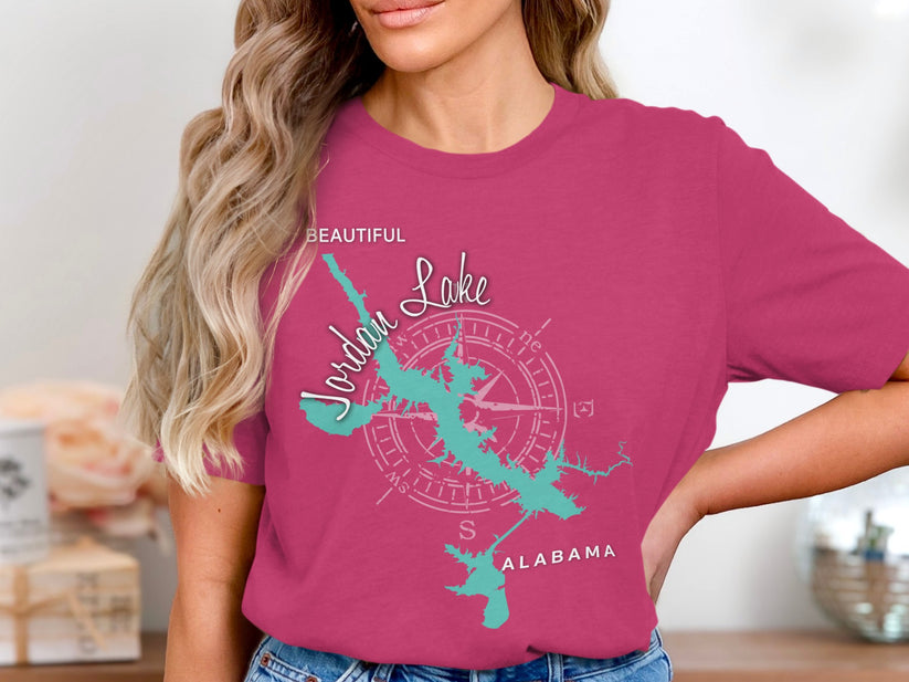 Pink t-shirt with a teal Jordan Lake map and compass graphic, reading "Beautiful Jordan Lake Alabama".