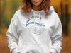 White hoodie featuring a compass graphic with a blue outline of Lake Merwin, Washington.