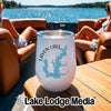A white stainless steel wine tumbler with a Lavon Lake graphic sits on a wooden boat table.