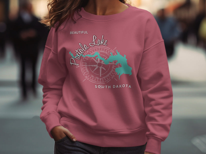 Pink sweatshirt with "Beautiful Badlands Lake South Dakota" text and map outline.