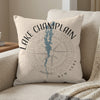 Lake Champlain New York map and compass design on a beige throw pillow.