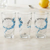Three clear glasses with blue maps and compass designs for Lake Springfield, Missouri.
