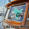 Teal state outline sticker with "Stevens Life" text on a boat window.