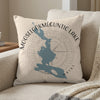 Light beige pillow with blue map of Mooselookmeguntic Lake and compass design.