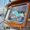 Kabetogama Life sticker on a boat's window, Lake Lodge Media logo below.
