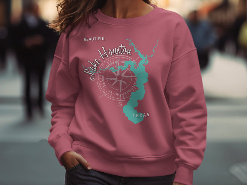 Pink sweatshirt with "Lake Houston" map and compass graphic.