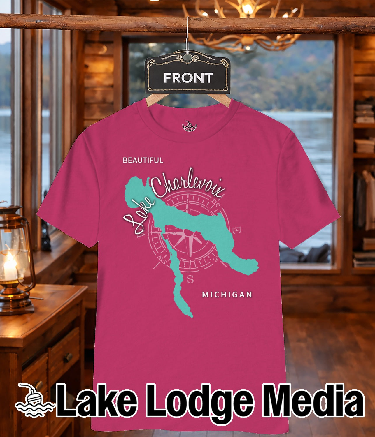 Pink t-shirt with "Lake Charlevoix Michigan" graphic featuring a compass rose.