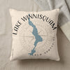 Cream pillow with Lake Winnisquam map and compass rose design.