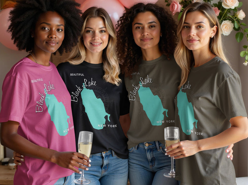 Four women wear t-shirts with Black Lake, New York graphic.