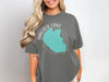 Gray t-shirt with "Hauser Lake Idaho" map graphic and compass rose design.