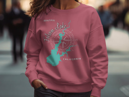 Pink sweatshirt with Folsom Lake map and compass graphic.