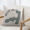 Pillow with Augur Lake map, compass, and New York text.